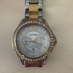 Women’s authentic Fossil watch.